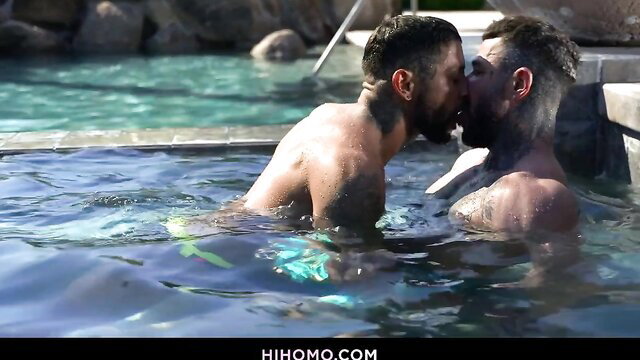 Andre Bedford & Danny Starr kissing passionately in outdoor hot tub