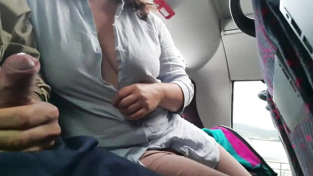 Voyeur MILF sucks and jerks cock on public bus