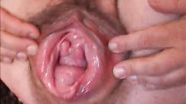 Mature babe's huge wet pussy fingered closeup by man