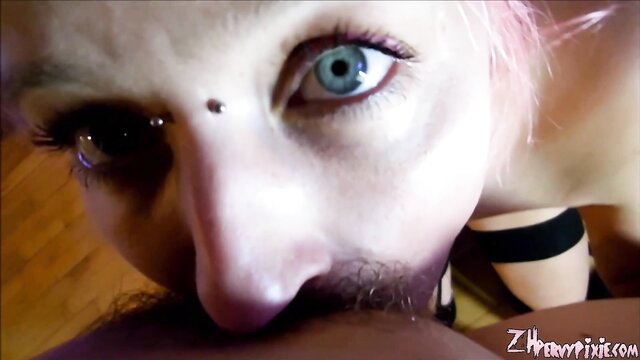 Pale goth girl with pink hair deepthroats cock POV closeup