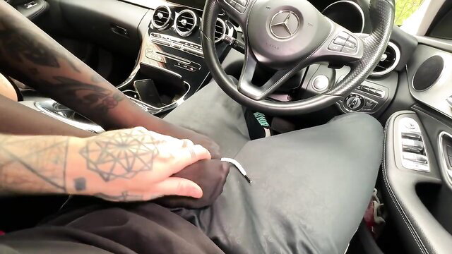 Tattooed guy fingers sexy amateur in stockings in car POV