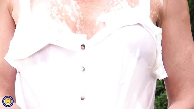 Blonde MILF wet shirt huge tits fingering backyard solo