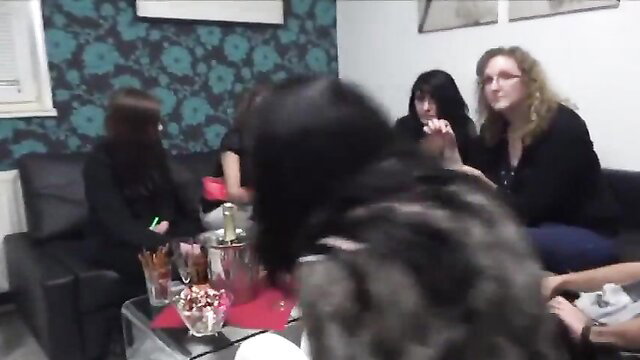 Group of women having a party, one blonde woman is visible