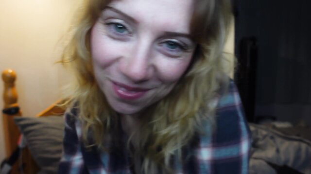 Jodie Marie ASMR blonde in plaid shirt smiles close-up