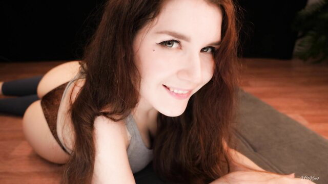 Redhead KittyKlaw in lingerie ASMR roleplay, smiling seductively on floor