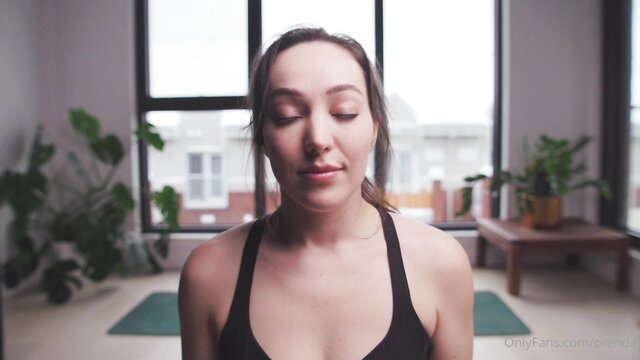 Orenda ASMR naked yoga teacher meditating in yoga class