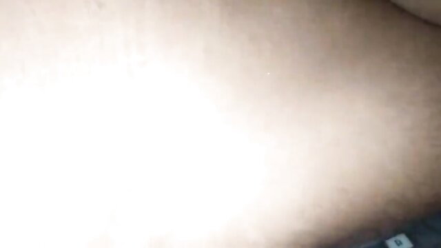 Blurry closeup of nude skin and shadowy figure in steamy desi couple video