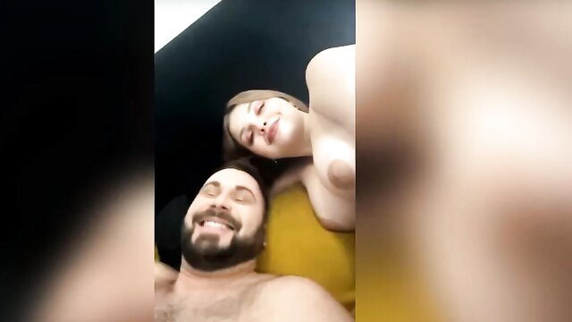 EgoLoveOff nude selfie with bearded man smiling on yellow pillow