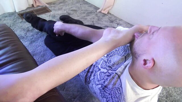 Kassondra Raine dominates bald man with foot on face in wild barefoot worship