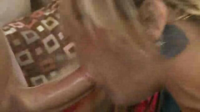 Blonde milf in red top gets facefucked on patterned couch