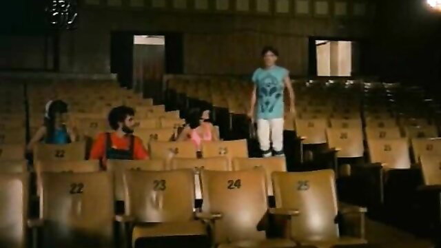 Classic Brazilian porn film thumbnail: group in theater seats