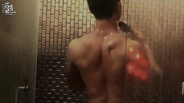 Muscular Asian jock Tommy showers nude, wet back view HD solo