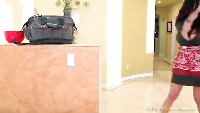 Ariella Ferrera in sexy skirt bending over kitchen counter