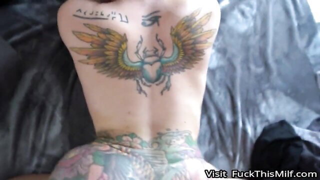 Thick white girl Bella scorpion's massive tattooed ass and back in sexy pose