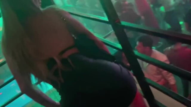 Deny Barbie's big tits bounce in tight dress at neon club