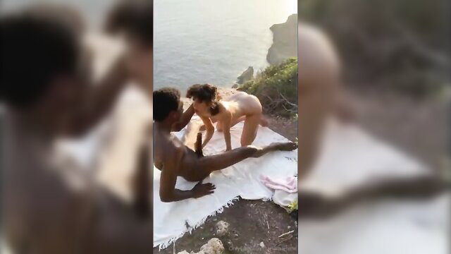 Nude Italian MILF fucked hard by black guy on cliffside overlooking ocean