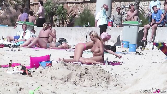 Real German MILF lesbians nude sex on public beach caught