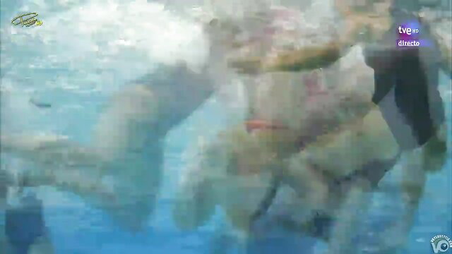 Shaved pussy closeup of wet water polo player in pool