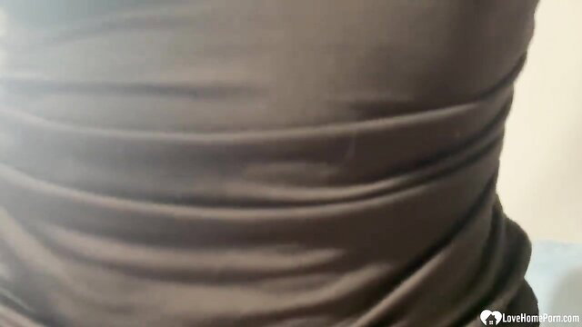 Spicy MILF in tight brown dress, teasing curves closeup