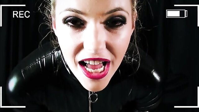 Jasmine Sinclair as seductive blonde in latex catsuit kidnapping fantasy