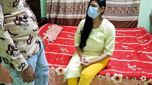 Indian bhabhi in yellow salwar sits on bed as horny step-brother looms lustfully