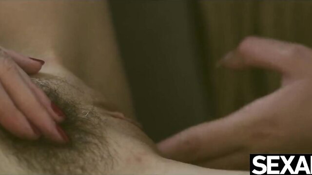 Samantha Bentley fingers Tracy Lindsay's hairy pussy in hot lesbian play