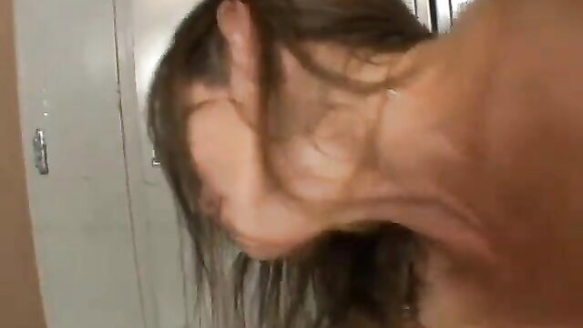 Brunette slut neck craned back in ecstasy during changing room anal fuck