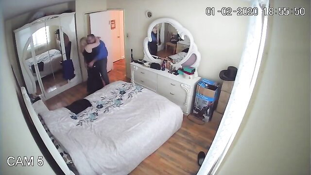 Hidden cam catches older couple embracing nude in hotel room