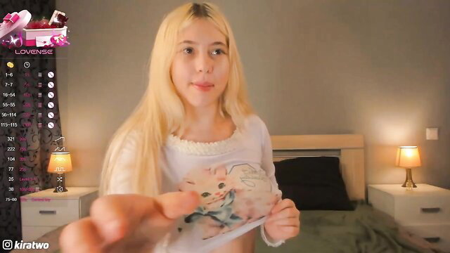 Blonde Slovakian big tits cam girl lifting sheer top teasing