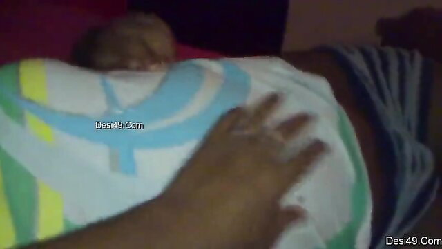 Sri Lankan amateur mom hand groping huge tits in bed closeup