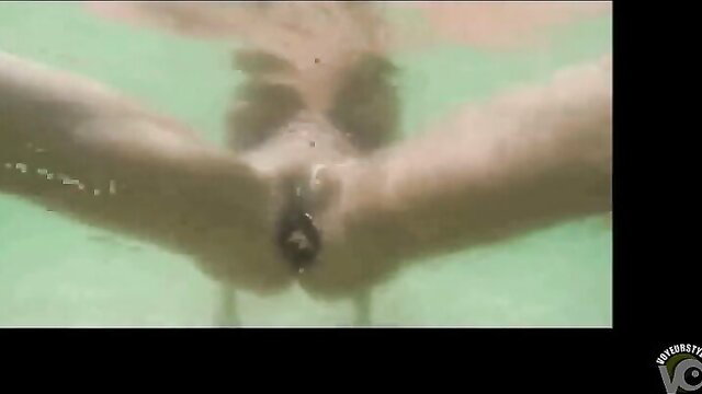 Busty girlfriend swims underwater with beer bottle in vagina