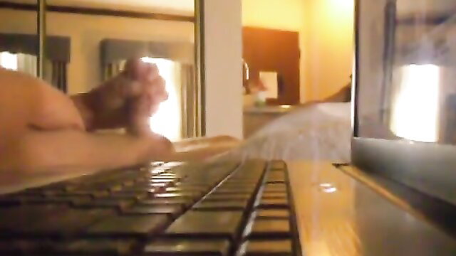 Hotel maid watches guy jerk off on laptop in room