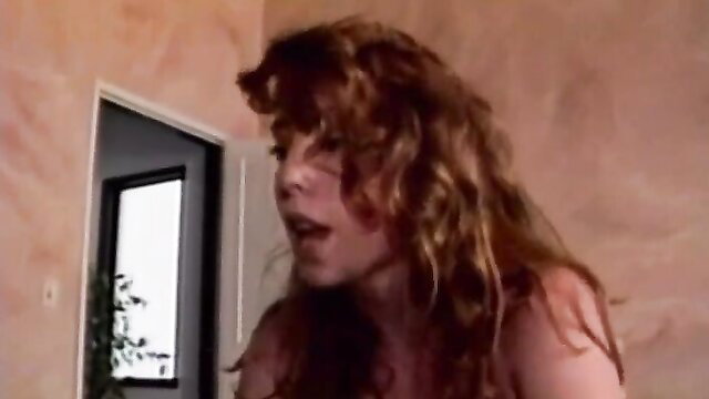 Redhead with curly hair in vintage 1992 porn scene from Sodomania 1