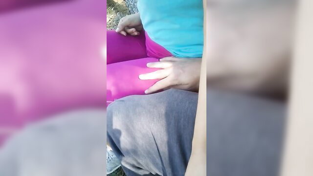 Amateur couple risky public handjob in forest, pink leggings blue top