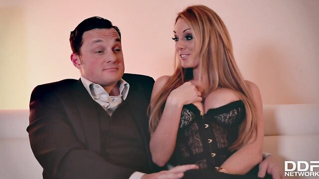 Hot blonde in lace corset teases suited guy in private DJ threesome