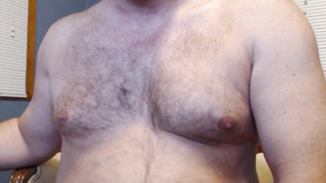 Hairy mature man shirtless showing chest in gay CBT preview