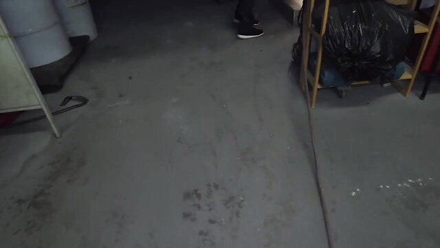 Veronica Rodriguez in dark warehouse, teasing ass in tight pants