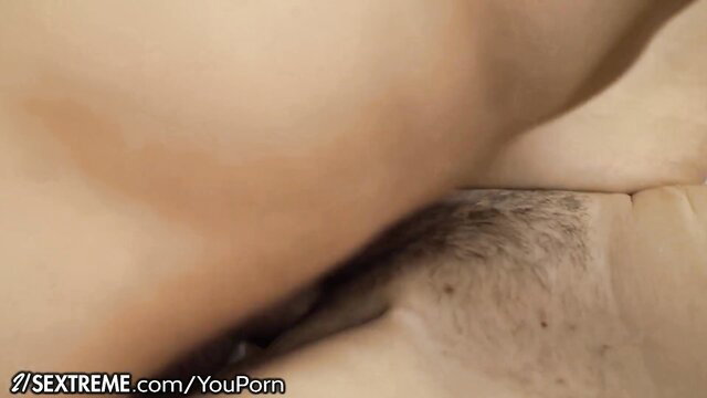 Mayna May GILF glasses sucking young stud's cock closeup