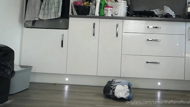 Samantha Flair's white laundry on kitchen floor in naughty stepdaughter scene