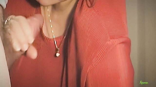 Mature slut in red top sucking cock closeup