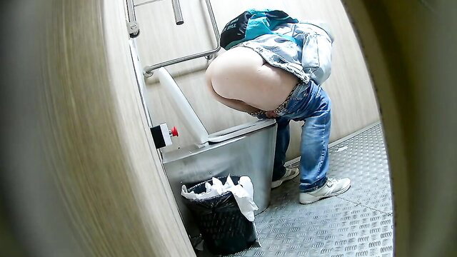 Spy cam of thick Asian teen's huge pale ass bent over in public street toilet