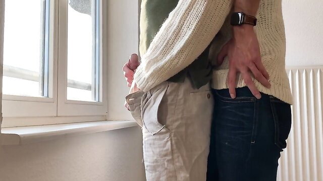 Couple embracing, hands on each other's buttocks