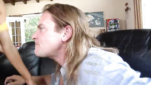 Man with long blonde hair having sex