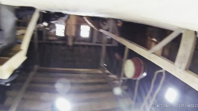 Elise Graves bound and restrained in Infernal Restraints dungeon