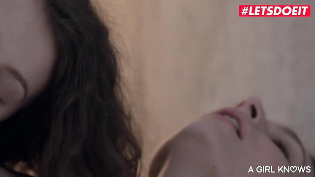 Closeup of hot brunette's face in ecstasy, lesbian fingering tease