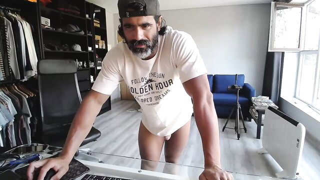 Muscular Latino daddy in white tee nude bulge DJing, gay amateur