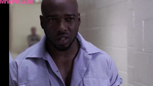 Sexy bald ebony man in open shirt, Hollywood hunk thumbnail