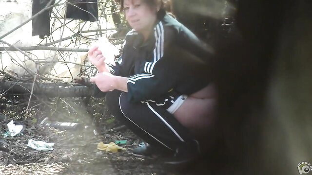 Redhead mom squats pants down pissing in woods amateur outdoor