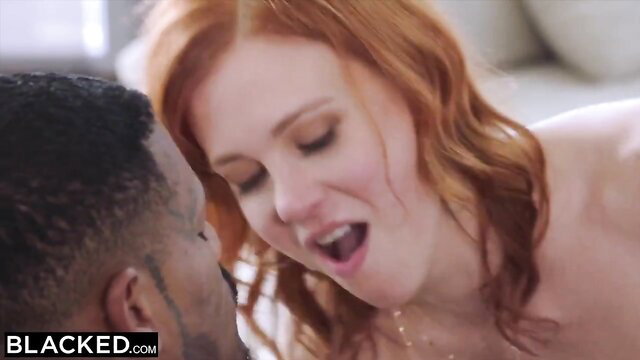 Maitland Ward redhead with big tits sucking BBC closeup