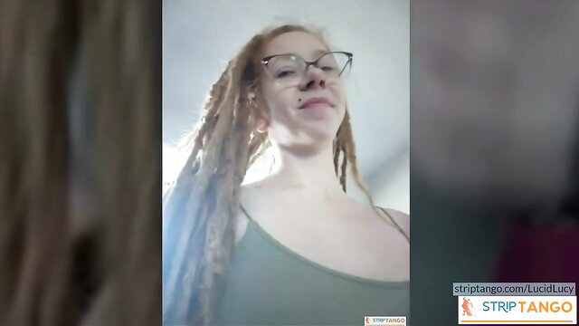 LucidLucy redhead dreadlocks girl in tank top teases on stripTango
